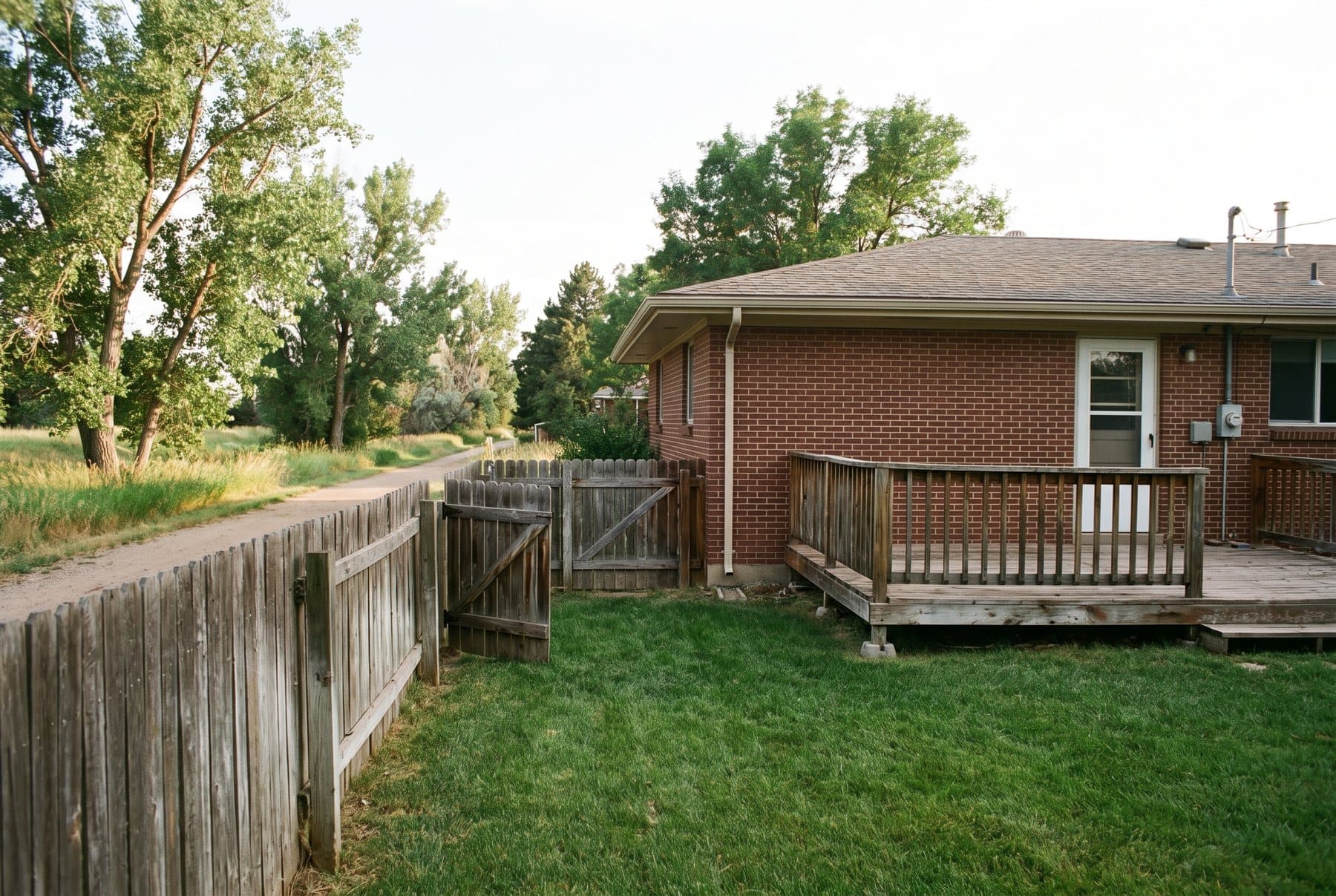 Brick ranch with a back gate onto open space, Westminster